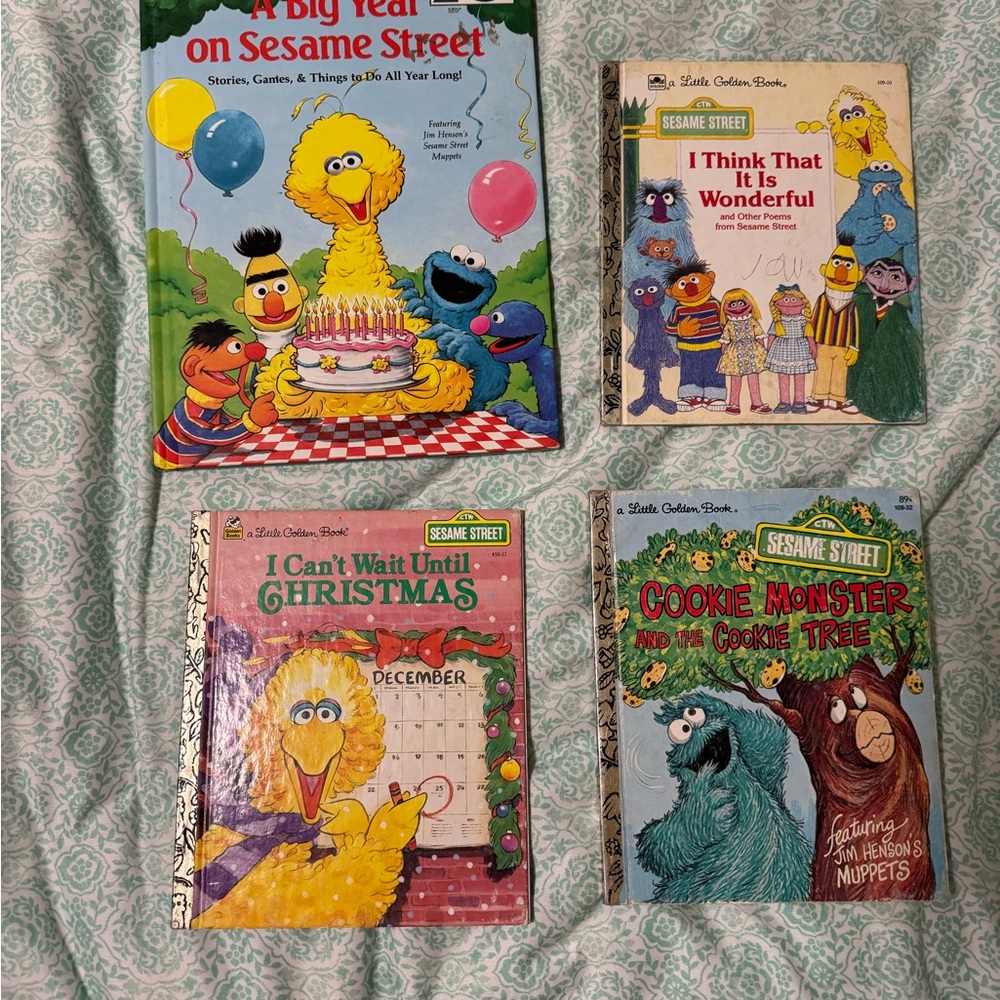 4 Sesame street books. Some has some writing in the them. From 1977 to 1989